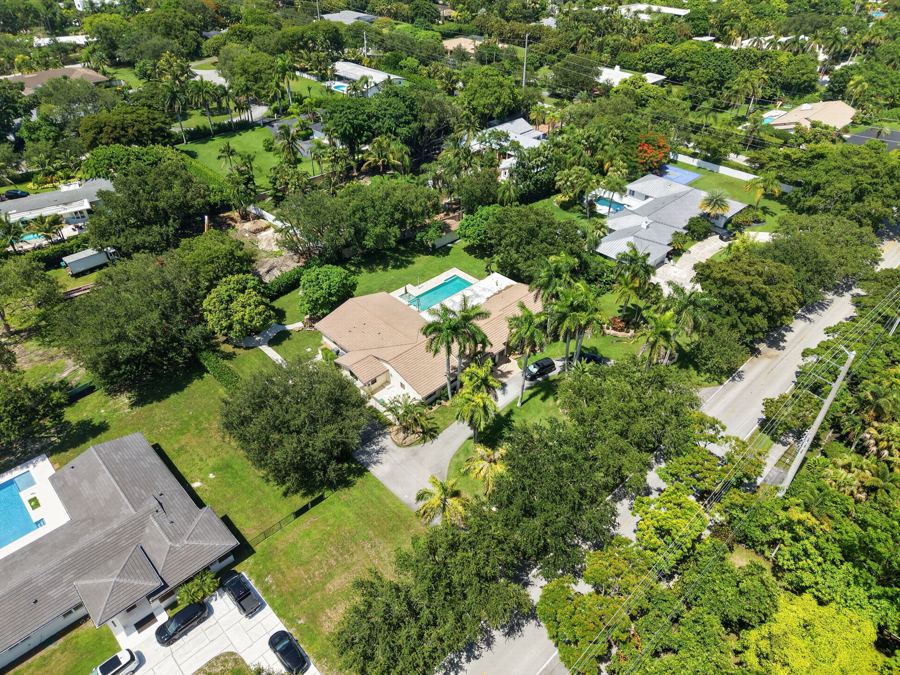 Aerial of a Pinecrest neighborhood canopy