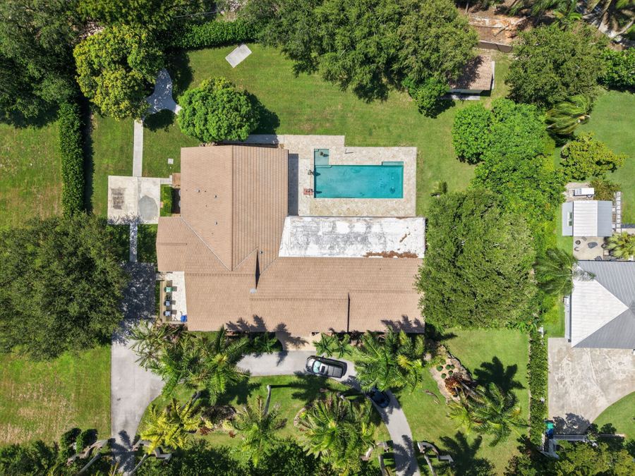 Top down drone image of a pool home