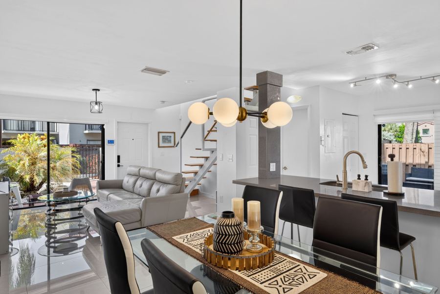 Dining room with chandelier and patio light