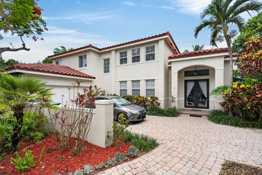 Mediterranean facade and tropical landscaping, Palmetto Bay